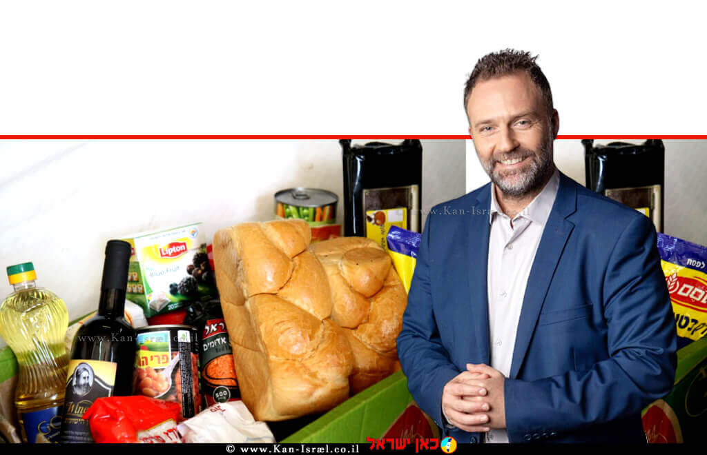 יושב ראש עמותת שניר מר ניר שמול ברקע: סלי מזון בסיסי לנזקקים | צילומים: אלישיב לויתן, תומר פדר | עיבוד צילום: שולי סונגו©